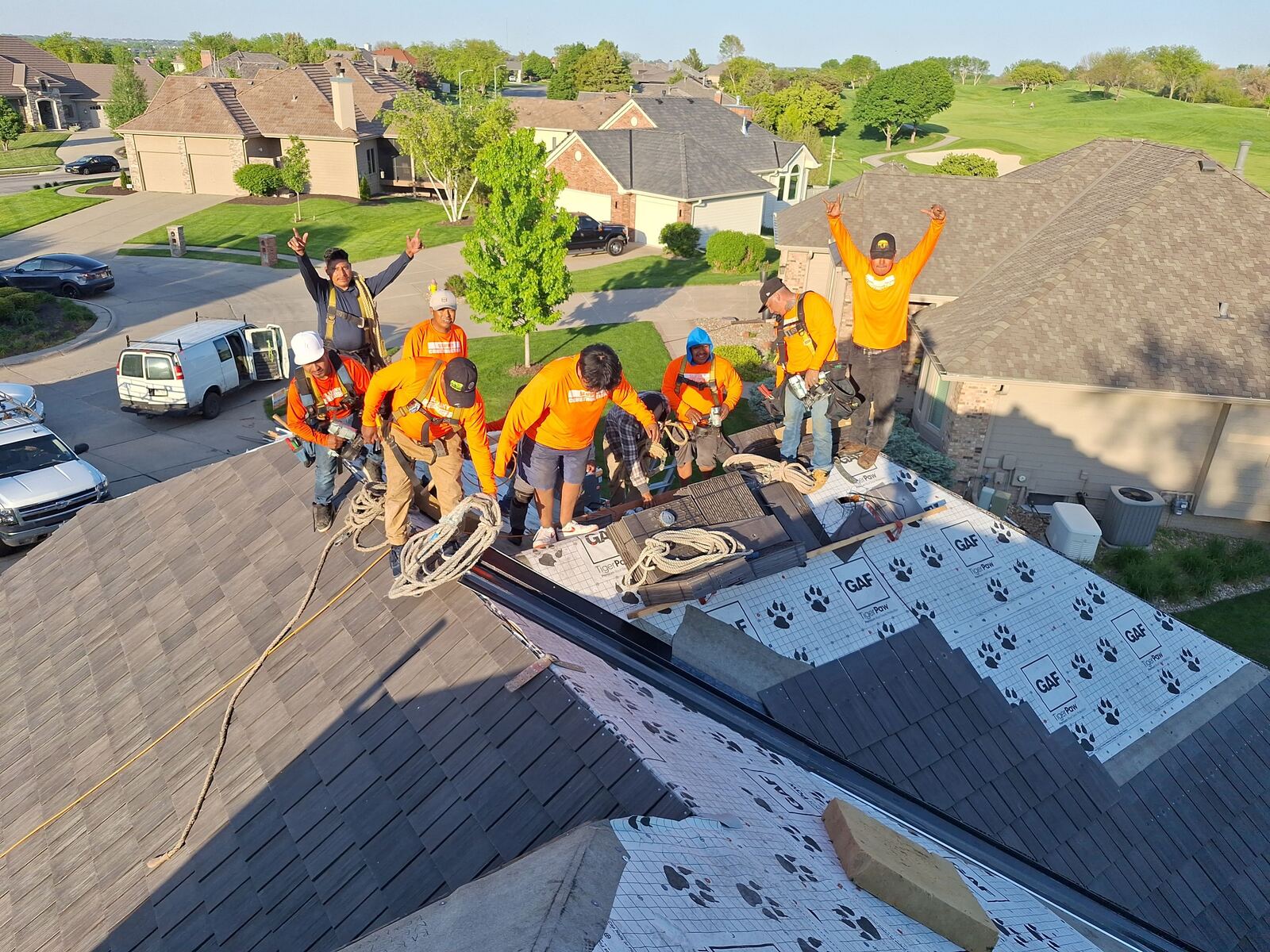 Slusky Construction roofing crew on a completed job in Omaha, NE