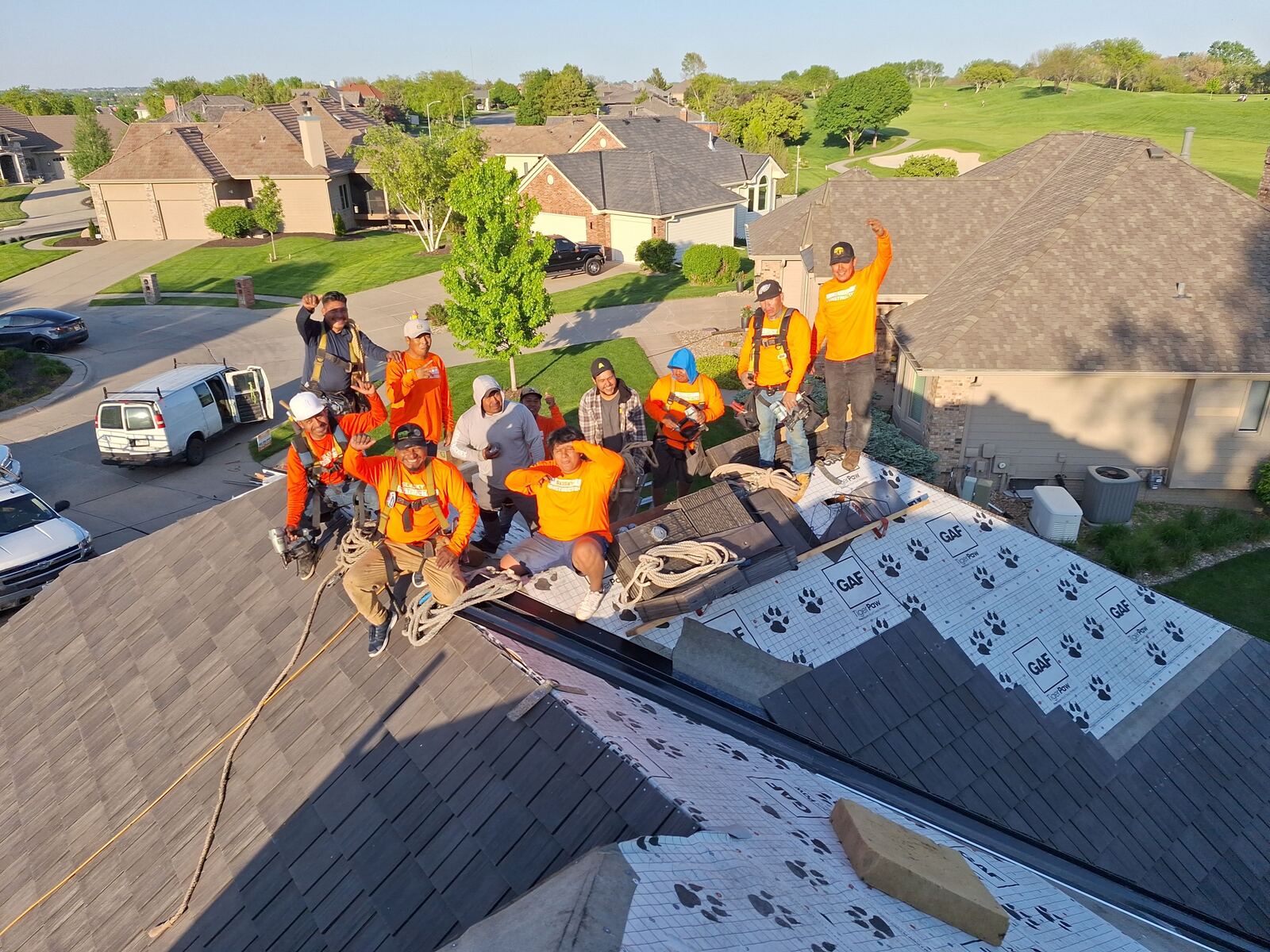 The Slusky Construction roofing team on a completed job