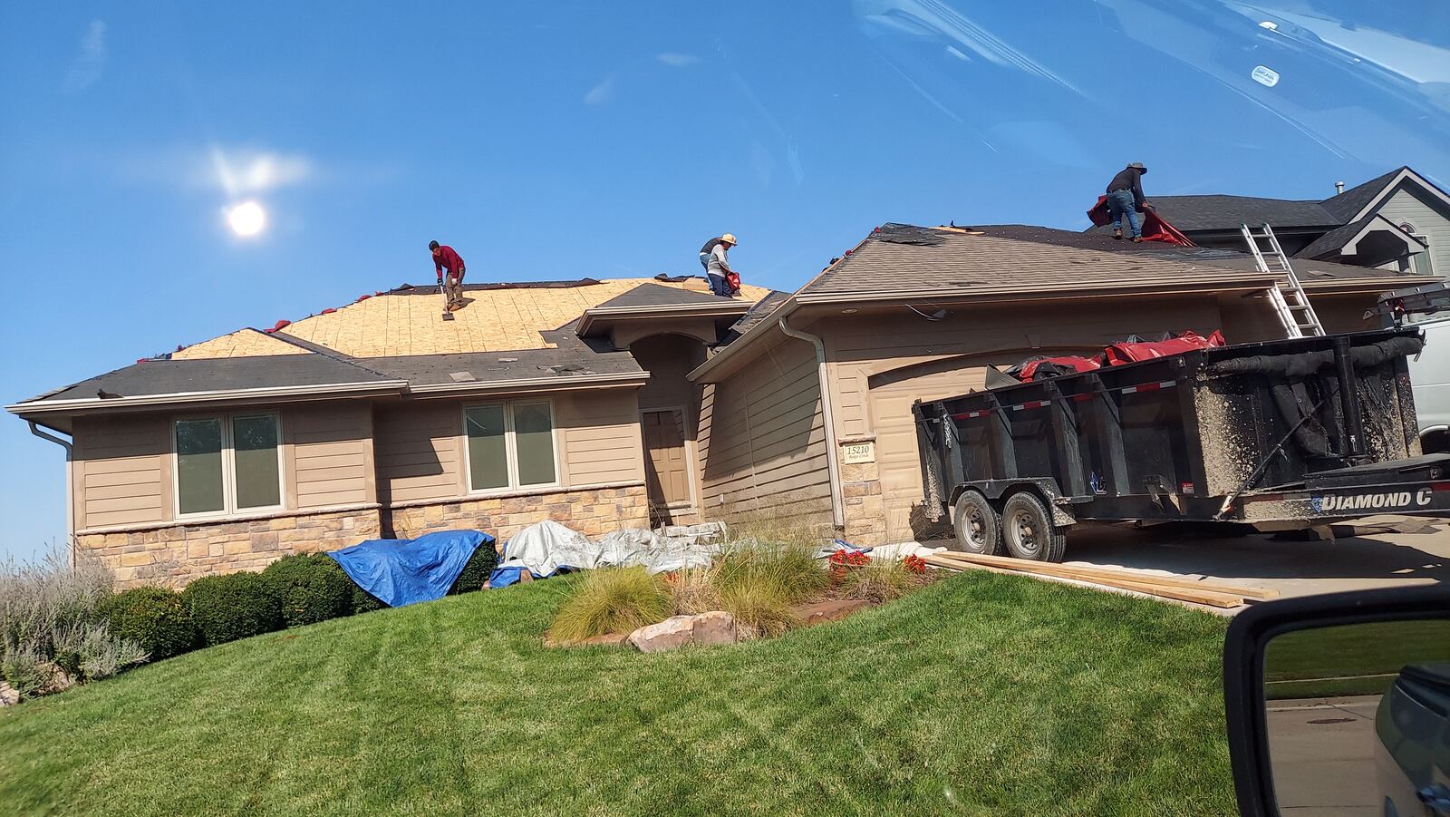 Residential roof replacement crew at work in the Omaha metro